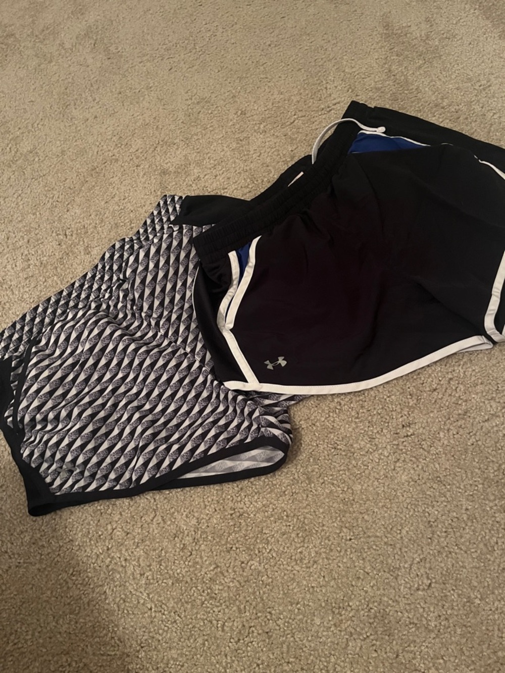 2 pairs of Under Armour Running Shorts- Small